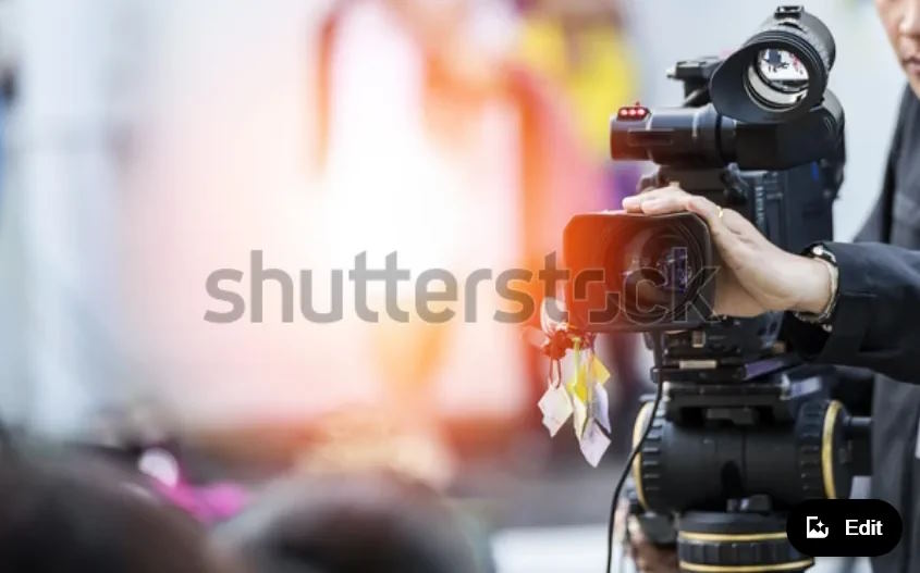 Film 2 Screenshot 2023-11-14 at 09-04-55 Video Camera Operator Working His Equipment Stock Photo 556157896 Shutterstock